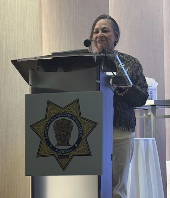 HAPCOA National President Mary Ruiz addresses NLPOA.